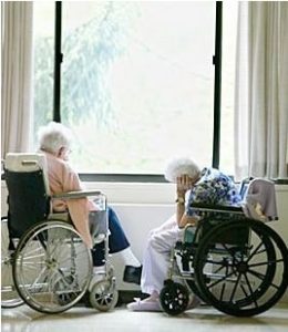 Two ederly people looking out of a window